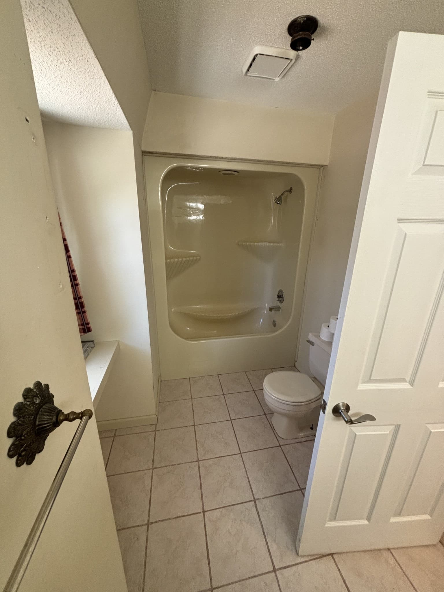 Tub-to-Tile Shower Conversion — before
